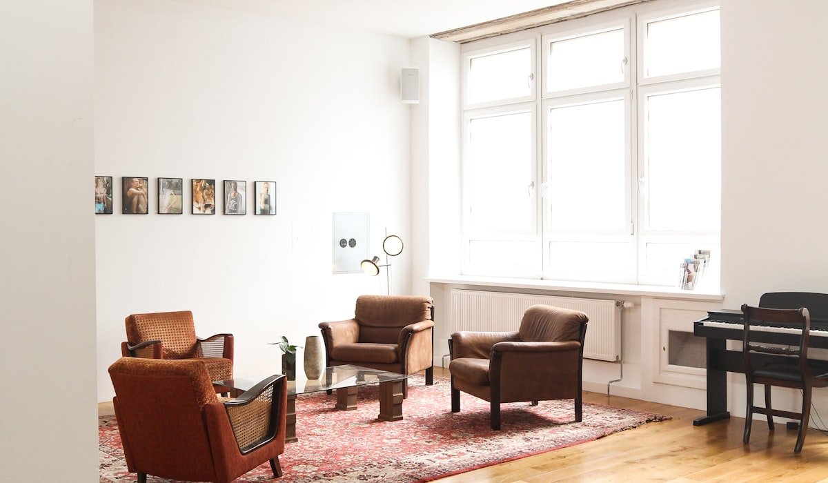 Warm parquet hardwood floor in a bright Ottawa living room with white walls