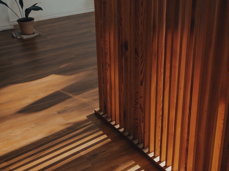 Wood staircase and structural detail representing subfloor work